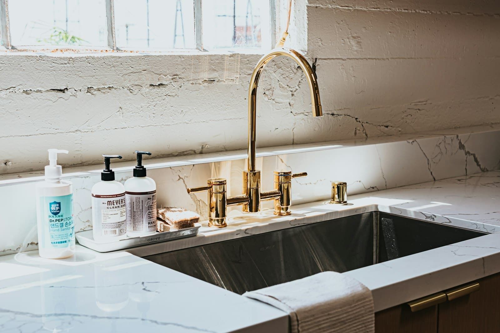 Residential kitchen sink and faucet